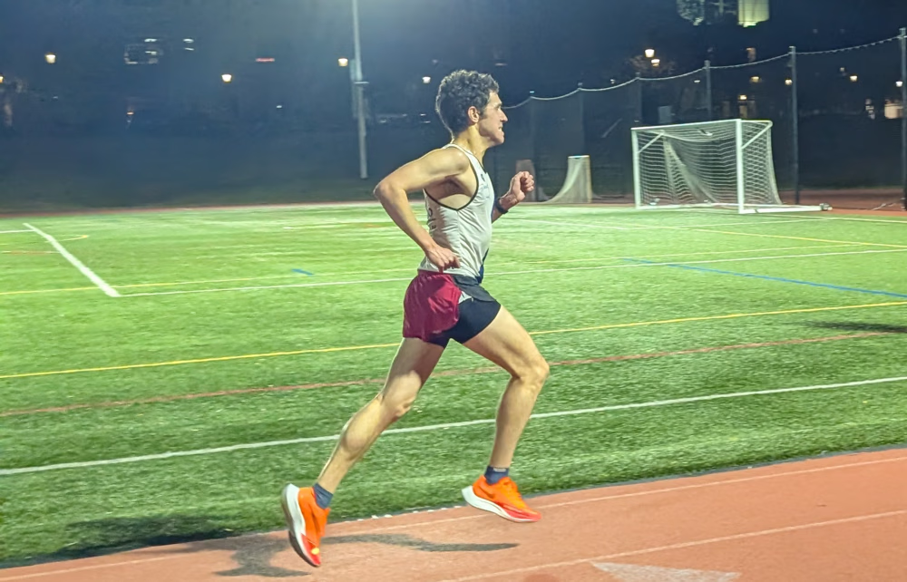 Grimacing at the suffering in the final push down the home straight.