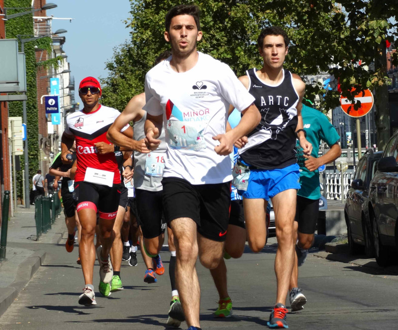 Near the front of the group chasing Atlemo guy.